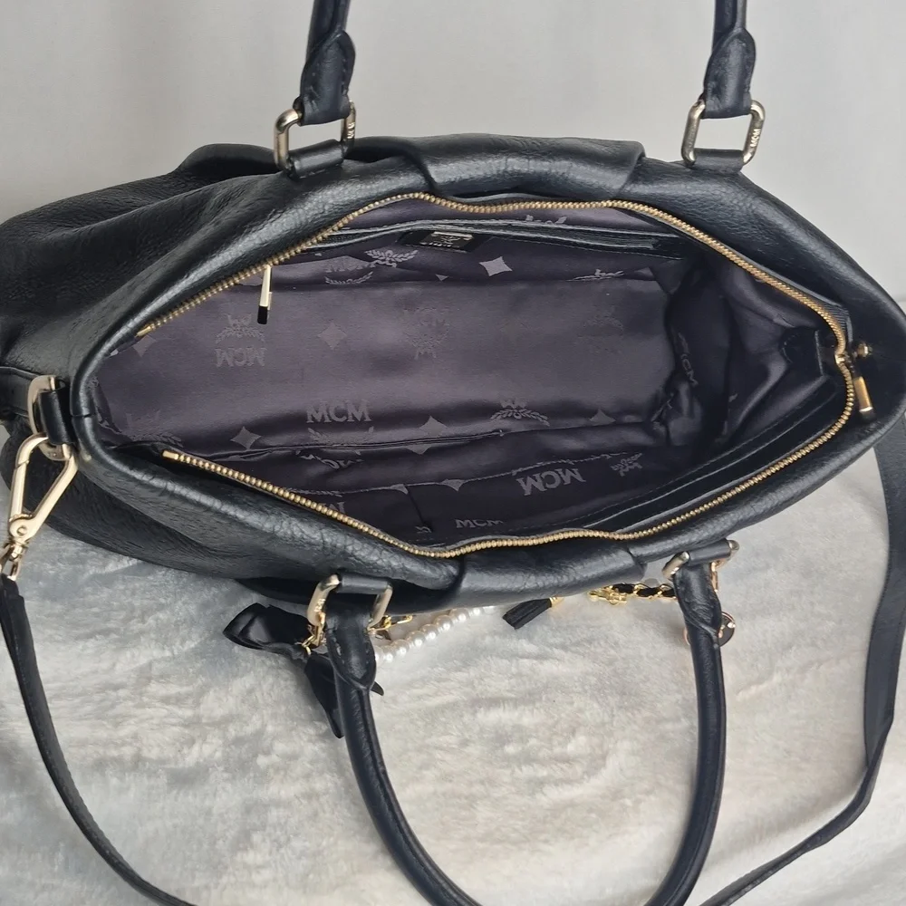 MCM Black Leather Handbag with Gold Accents